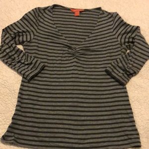 Flirty black and gray striped t-shirt with deep V neckline